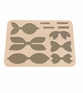 Plastic bow template with multiple designs and tails