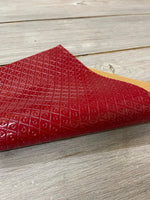 
              Red patent embossed
            