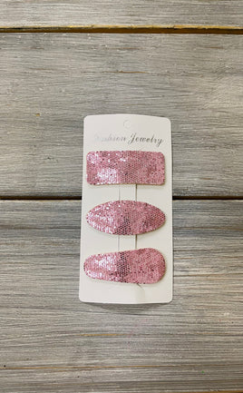 Light pink felt backed snap clip set on card